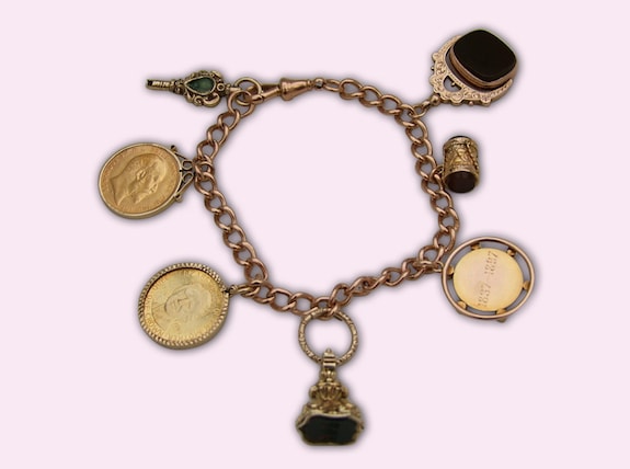 sell gold charm bracelet